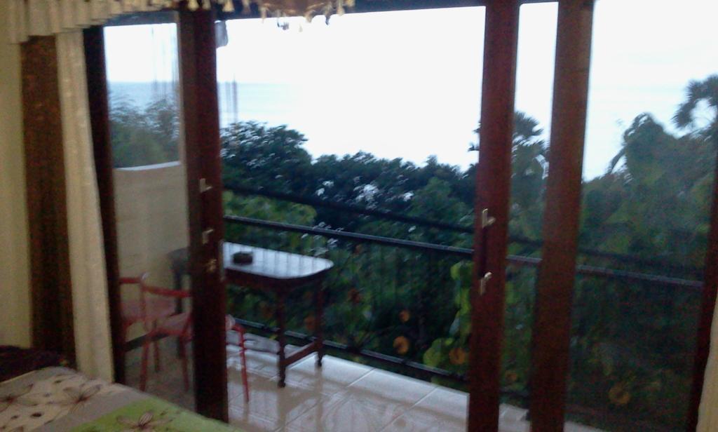 Sri Homestay Amed Buitenkant foto
